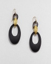 From the Lucite Collection. Sleek oval loops of hand-painted, hand-sculpted Lucite are connected by a golden bale with a rich pebble texture.LuciteGoldtoneLength, about 2.4Ear wireMade in USA