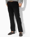 Classic-fitting pants tailored in fine woven cotton, designed with a flat front, narrow leg and washed for a vintage, timeworn appeal. Standard-rise belted waist. Angled hand pockets, split-besom pockets at back. Embroidered pony accents the back right pocket. Zip fly with button closure.