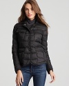 This simple quilted down jacket from Parajumpers is streamlined and stylish for cold weather days. Four patch pockets provide ample storage space for on-the-go essentials.