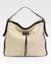 Woven hemp gives a boho feel to this roomy top-handle carryall finished with rich leather trim.Top handle, 3¾ dropTop zip closureExpandable zip gussetsOne inside zip pocketTwo inside open pocketsSating lining16½W X 15¾H X 4¾DMade in Italy