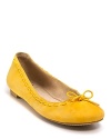 DIANE von FURSTENBERG's yellow leather flats are style magic. Wear to add sunshine to denim or dresses.