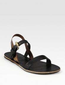 Smooth leather style with an adjustable ankle strap and a metallic elastic slingback. Leather and elastic upperLeather liningRubber soleMade in ItalyOUR FIT MODEL RECOMMENDS ordering true whole size; ½ sizes should order the next whole size up. 