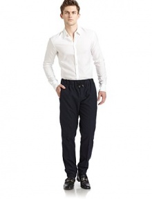 THE LOOKWide elastic waistband with drawstring tiesButton flyDual seam pocketsElastic cuffsBack flap pocketTHE FITRise, about 10Inseam, about 29½THE MATERIAL62% cotton/38% woolCARE & ORIGINDry cleanMade in Italy THE LOOKWide elastic waistband with drawstring tiesButton flyDual seam pocketsElastic cuffsBack flap pocketTHE FITRise, about 10Inseam, about 29½THE MATERIAL62% cotton/38% woolCARE & ORIGINDry cleanMade in Italy