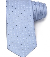 An opulent tie in lavish Italian silk features an allover diamond design in a classic width.