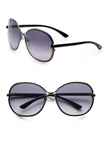 Sleek, shiny metal frames in a modern, round shape. Available in shiny gunmetal with smoke gradient lens. 100% UV protectionMade in Italy Sleek, shiny metal frames in a modern, round shape. Available in shiny gunmetal with smoke gradient lens. 100% UV protectionMade in Italy