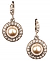 Glamorous appeal. Givenchy's evening-ready drop earrings add elegance and poise with blush-colored glass pearls and sparkling glass accents. Set in brown gold-plated mixed metal. Approximate drop: 1-1/4 inches.