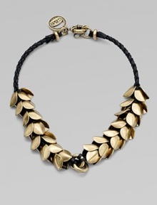 A braided leather rope with a cascading layer of petals make this an eye-catching piece. LeatherAntique-finished brassLength, about 18Spring ring closureImported A braided leather rope with a cascading layer of petals make this an eye-catching piece. LeatherAntique-finished brassLength, about 18Spring ring closureImported
