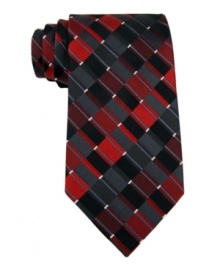 Contrasting colors give this tie from Kenneth Cole Reaction just the right angle no matter which way you look at it. Contrasting colors give this tie from Kenneth Cole Reaction just the right angle no matter which way you look at it.