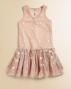 This airy, tulle shell frock owes its fancy edge to allover, bejeweled polka dots.ScoopneckSleevelessKeyhole back closurePullover styleFull skirtLining: Cotton Overlay: PolyesterMachine washImported