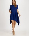 Soft, fluid jersey, in a flowy, easy-to wear A-line silhouette.Jewel necklineShort dolman sleevesAsymmetrical hemlineBack keyhole button closureAbout 31½ from natural waist82% viscose/18% linenDry cleanMade in Italy of imported fabricModel shown is 5'11 (180cm) wearing US size 4. 