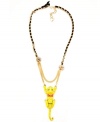 Hold on little tiger. Betsey Johnson's antique gold tone mixed metal necklace has multiple chains and a black grosgrain ribbon. The cute tiger pendant features red and gold-tone details and crystal accents. Approximate length: 28 inches + 3-inch extender. Approximate drop: 4-3/4 inches.