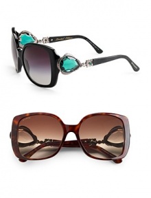 Acetate square frames with lavish stone embellished temples inspired by the one-of-a-kind Bvlgari emerald earrings sold in 2010. Available in black pearl with emerald colored stone and grey gradient lens or dark havana with smoke colored stone and brown gradient lens.UV 400 lens Made in Italy Acetate square frames with lavish stone embellished temples inspired by the one-of-a-kind Bvlgari emerald earrings sold in 2010. Available in black pearl with emerald colored stone and grey gradient lens or dark havana with smoke colored stone and brown gradient lens.UV 400 lens Made in Italy