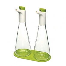 Adjust the flow of liquid while you pour for perfectly dressed salads and dishes. Simply depress the large button on each cap to control the flow as you pour - pressing more for thicker liquids, such as oil, and less for thinner, such as vinegar. The flasks curved shape is intuitive to hold and stores easily on the accompanying silicone coaster. Adjust the flow of liquid while you pour for perfectly dressed salads and dishes. Simply depress the large button on each cap to control the flow as you pour - pressing more for thicker liquids, such as oil, and less for thinner, such as vinegar. The flasks curved shape is intuitive to hold and stores easily on the accompanying silicone coaster.
