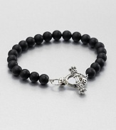 Elegant black onyx beads are joined together by logo-engraved toggle clasp of sterling silver.Sterling silverBlack onyxDiameter, about 3Width, about 8mmToggle claspMade in USA