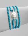 A glistening baroque pearl, surrounded by strands of turquoise beads, is accented by sparkling cubic zirconia. 14mm baroque pearl Cubic zirconia Sterling silver Length, about 7½ Lobster clasp Made in Spain 