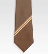 A wardrobe essential in silk made elegant with a diagonal stripe.SilkDry cleanMade in Italy