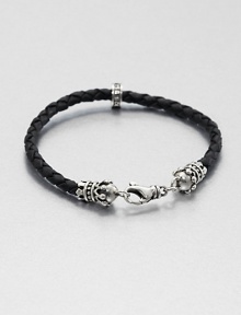 Thin braided leather bracelet is interrupted by a sterling silver crown for a refined, luxurious look, accented with a signature logo detail of sterling silver.Sterling silverLeatherAbout 9 longLobster claspMade in USA Thin braided leather bracelet is interrupted by a sterling silver crown for a refined, luxurious look, accented with a signature logo detail of sterling silver.Sterling silverLeatherAbout 9 longLobster claspMade in USA