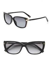 Stylish, ridged metal accent these petite plastic frames. Available in shiny black with grey gradient lens or havana with brown gradient lens. Logo temples100% UV protectionMade in Italy Stylish, ridged metal accent these petite plastic frames. Available in shiny black with grey gradient lens or havana with brown gradient lens. Logo temples100% UV protectionMade in Italy