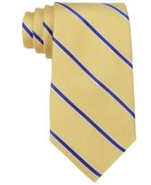 You'll never go wrong with this crisp classic striped tie from Tommy Hilfiger. You'll never go wrong with this crisp classic striped tie from Tommy Hilfiger.