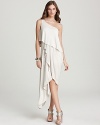 Cut a striking asymmetrical silhouette in this BCBGMAXAZRIA one-shoulder dress.