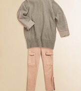 A luxurious hoodie with dress shirt cuffs and details on the sleeves, finished with a touch of cashmere. Long cuffed sleeves Pull-on style Side slash pockets Ribbed hem 95% cotton/5% cashmere Machine wash Imported