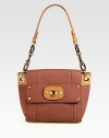 Buttery smooth lambskin in a structured flap silhouette, adorned with polished hardware and a signature chain and leather strap.Chain and leather shoulder strap, 11 dropTurnlock flap closureOne outside open pocketOne inside zip pocketOne inside open pocketFaille lining9¼W X 8¼H X 2¾DImported