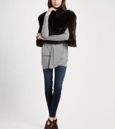 Lush faux fur adds a touch of luxury to this chic, cropped topper.High neck with side zipper Open sleeves Slash pockets Cotton lining About 18 from shoulder to hem 55% acetate/45% polyester Dry clean Made in Italy