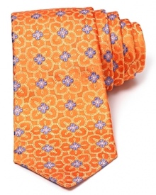 A subtle floral print takes form on luxe silk with this classic tie from Ike Behar. A subtle floral print takes form on luxe silk with this classic tie from Ike Behar.