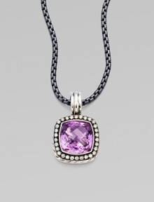 From the Moonlight Ice Collection. A beautiful amethyst stone surrounded by pavé diamonds. Amethyst Diamonds, 0.45 tcw Blackened sterling silver Size, about ½L X ½ W Imported Please note: Chain sold separately. From the Moonlight Ice Collection. A beautiful amethyst stone surrounded by pavé diamonds. Amethyst Diamonds, 0.45 tcw Blackened sterling silver Size, about ½L X ½ W Imported Please note: Chain sold separately.
