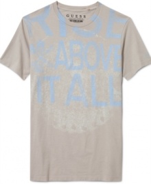 Go bold. This graphic t-shirt from Guess gives your look a leg up. Go bold. This graphic t-shirt from Guess gives your look a leg up.