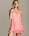 Curl up in this soft, flowy slip with ruffle and rosette trim at neckline and hem. Style #732310