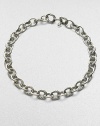 From the Oval Link Collection. Large sterling silver links alternate between smooth and cabled in a chain to wear alone or with a jeweled enhancer. Sterling silver Length, about 17½ Hidden spring clip clasp Imported