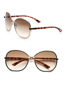 Sleek, shiny metal frames in a modern, round shape. Available in shiny light bronze with brown gradient lens. 100% UV protectionMade in Italy Sleek, shiny metal frames in a modern, round shape. Available in shiny light bronze with brown gradient lens. 100% UV protectionMade in Italy