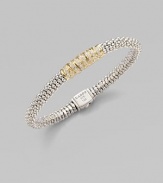 From the Embrace Collection. Dazzling diamonds in radiant 18k gold wrapped around beaded sterling silver for a modern yet romantic piece.Diamonds, .29 tcw18k goldSterling silverDiameter, about 2¼Box clasp closureImported