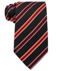 Mix work and play with multiple patterns on this silk tie from Sean John. Mix work and play with multiple patterns on this silk tie from Sean John.