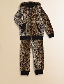 A chic and casual leopard spotted knit with a cozy hood and an easy shape.Attached hood with solid liningZip frontLong sleeves with ribbed knit cuffsSplit kangaroo pocketsRibbed hemLooped French terry lining47% cotton/47% modal/6% spandexMachine washMade in Italy A chic and casual leopard spotted knit with a cozy hood and an easy shape.Attached hood with solid liningZip frontLong sleeves with ribbed knit cuffsSplit kangaroo pocketsRibbed hemLooped French terry lining47% cotton/47% modal/6% spandexMachine washMade in Italy