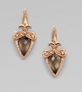 From the Superstud Collection. A glowing baroque setting, edged with diamonds, holds a faceted triangle of smoky quartz layered over mother-of-pearl for a soft, hazy effect in these elegant drops.Diamonds, .13 tcwSmoky quartz and white mother-of-pearlRose goldplated sterling silverLength, about 1¾Post-and-hinge back with 14k gold postImported