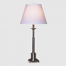 Brushed chrome finish over metal and brass. Three way switch. Ascot white fabric shade. Adjustable height from 24 to 30. Brushed chrome finish over metal and brass. Three way switch. Ascot white fabric shade. Adjustable height from 24 to 30.