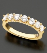 Exquisite beauty, timeless design. 14k gold ring features seven round-cut diamonds (1 ct. t.w.).
