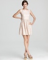 Flaunting a flair for the feminine, this French Connection dress masters party style with pink lace and a twirl-perfect pleated skirt. Metallic sandals complete with chic--you just add the tiara.