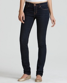J Brand pencil leg jeans in ink are a slim fit pant with a 12 leg opening. Five pockets, brass hardware and orange stitching. Button and zipper closure and whiskering on front. Plain pockets on back. J Brand pencil leg jeans in ink are a slim fit pant with a 12 leg opening. Five pockets, brass hardware and orange stitching. Button and zipper closure and whiskering on front. Plain pockets on back.