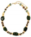 Green and gold creates a lovely necklace from Jones New York. The all-around design boasts resin and plastic beads in varying shapes. Crafted in worn gold tone mixed metal. Approximate length: 17 inches + 2-inch extender.