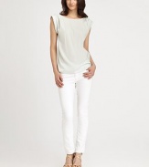 A minimalist sheath of sumptuous silk charmeuse, tailored with casual rolled sleeve and a clean front.BoatneckRolled cap sleevesFlat frontStraight hemAbout 24 from shoulder to hemSilkDry cleanImportedModel shown is 5'9 (175cm) wearing US size Small.