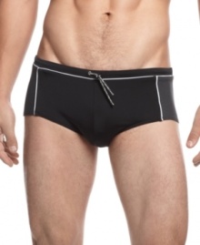 Get comfortable. Consistently look and feel at your best in these classic brief swim trunks from Calvin Klein. Get comfortable. Consistently look and feel at your best in these classic brief swim trunks from Calvin Klein.