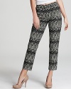 Designed in a flattering slim silhouette, these DKNY stretch cotton pants are patterned in an optic geometric print for modern, standout style.