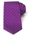 A brilliant design, from the strikingly rich color to the ingenious and unique craftsmanship of Turnbull & Asser, this classic tie features a polka dot pattern with a herringbone ground for a dynamic accent to your dress shirting.
