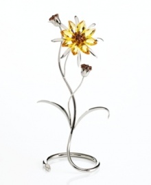 Marigold-inspired blossoms crafted in light topaz with smoked topaz crystal accents inspire instant cheer in any environment. The sunny yellow petals take root in a gracefully swirling, silvertone metal stand. Marigold-inspired blossoms crafted in light topaz with smoked topaz crystal accents inspire instant cheer in any environment. The sunny yellow petals take root in a gracefully swirling, silvertone metal stand.