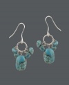 Add a little bohemian inspiration. This free-spirited style by Avalonia Road is perfect for summer. Earrings feature clusters of turquoise strung from a looping, sterling silver setting. Approximate drop: 1-1/2 inches.