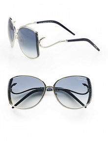 This sleek design boasts a ridged metal frame with hook detailed temples for a truely unique look. Available in shiny palladium blue with dark blue gradient lens. Hook detailed temples100% UV protectionMade in Italy This sleek design boasts a ridged metal frame with hook detailed temples for a truely unique look. Available in shiny palladium blue with dark blue gradient lens. Hook detailed temples100% UV protectionMade in Italy