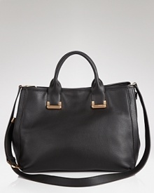 Rachel Zoe's leather tote proves practical accessories have a place in the most discriminating closets. In fine leather with polished details, it's positively major. Rachel Zoe's leather tote proves practical accessories have a place in the most discriminating closets. In fine leather with polished details, it's positively major.